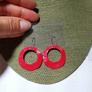 Women`s silver tone red dangle earrings. 1 1/4 inc